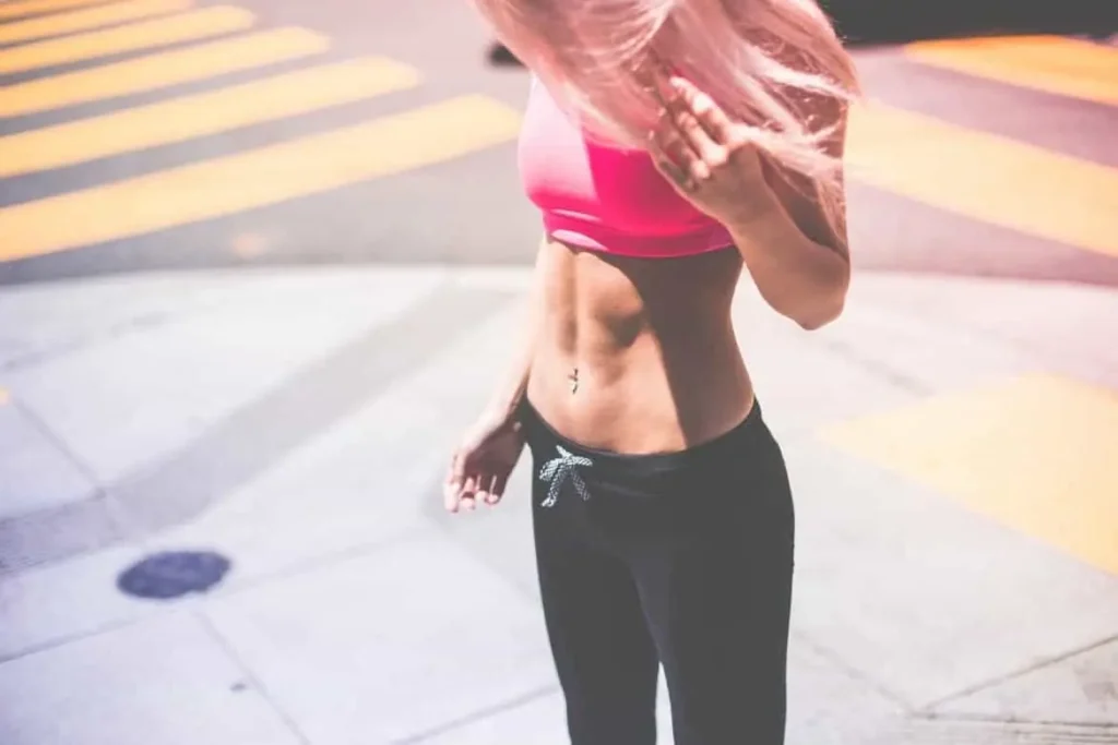 Woman with toned stomach after LA-EMS Body Sculpting Treatment Lewes
